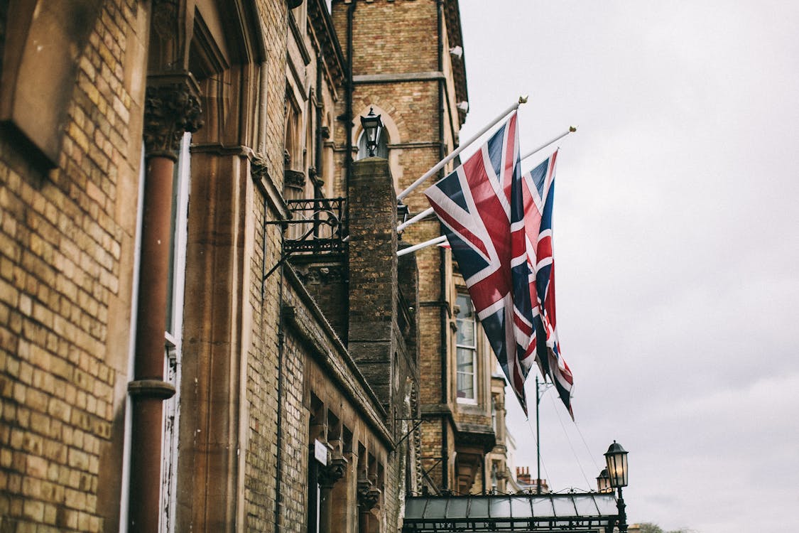 Union flags beside a London building